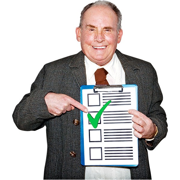 Man holding clipboard with checklist with big green tick