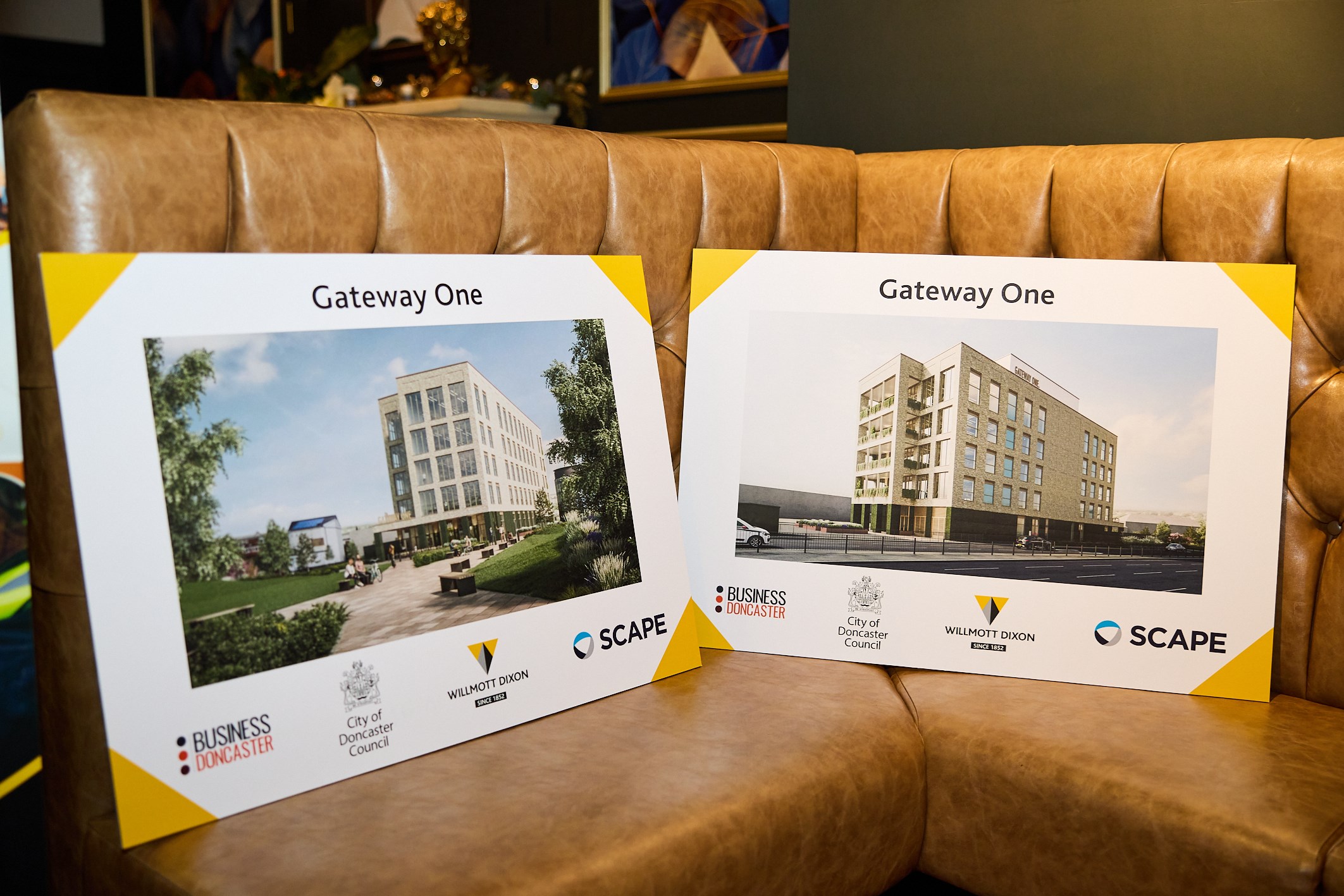 Boards showcasing what the new building will look like 