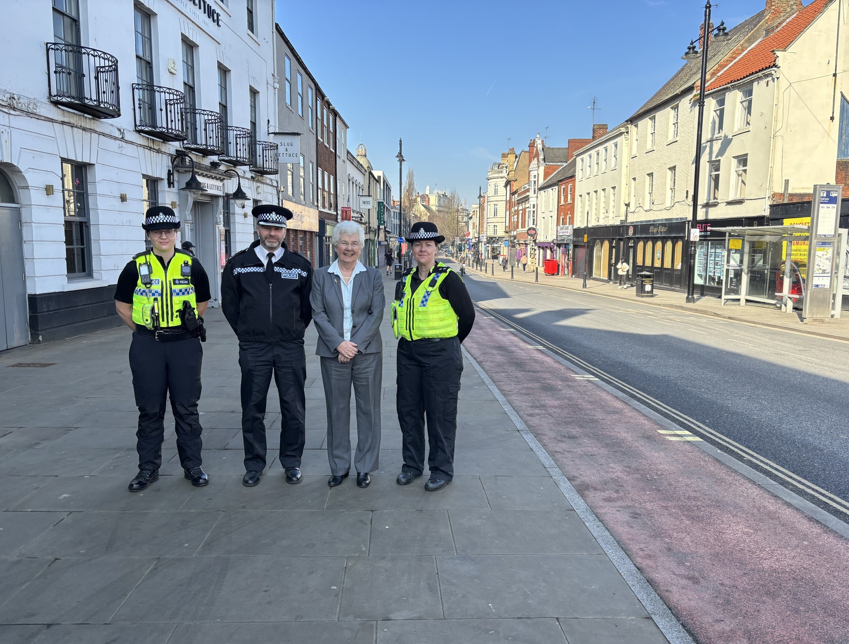 Mayor Jones stands with police officers on the High Street