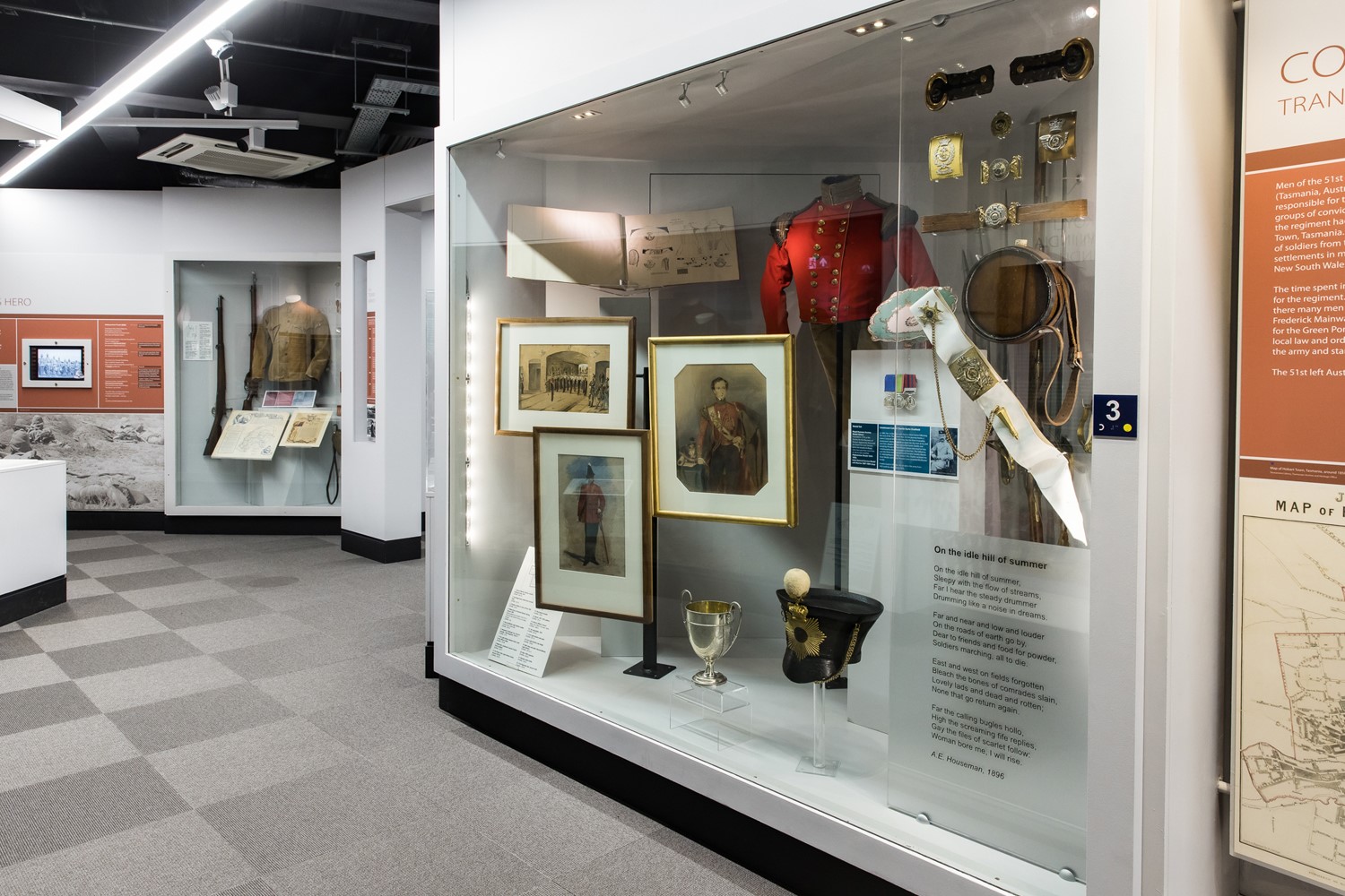 Museum displays in the King’s Own Yorkshire Light Infantry museum showing uniforms, medals and paintings 