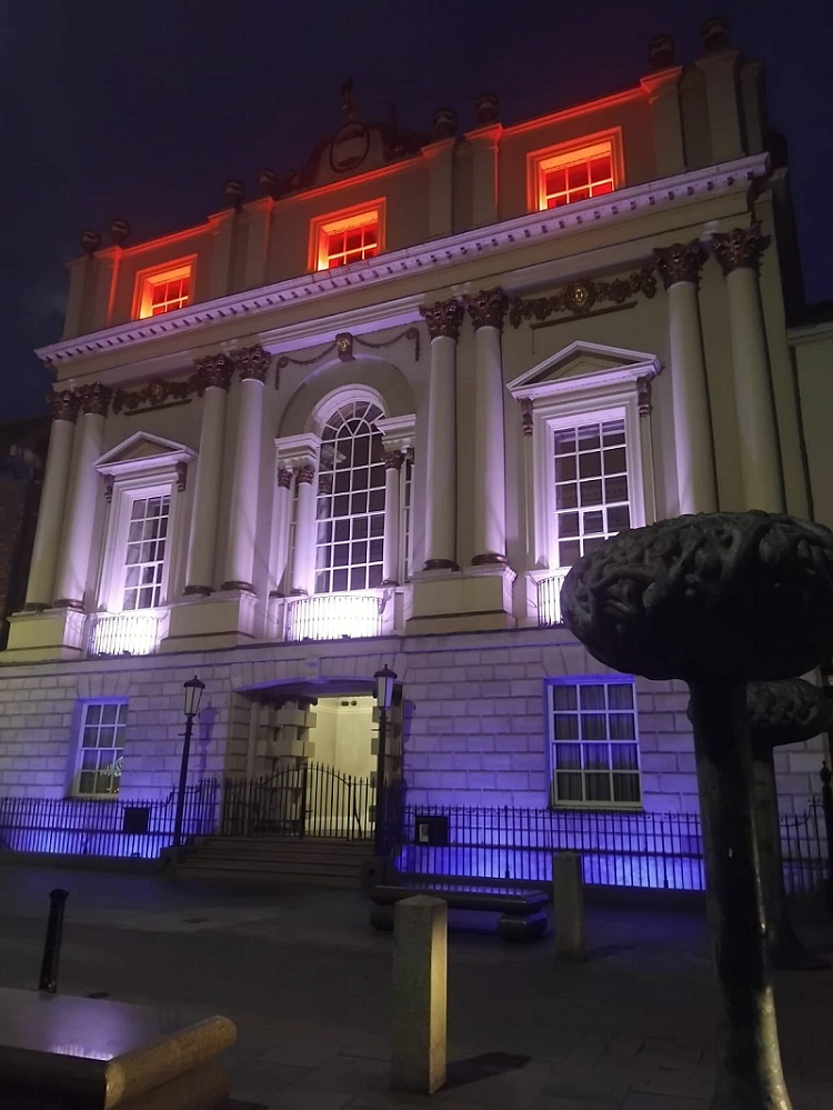 Mansion House illuminated with Union Jack colours red, white and blue